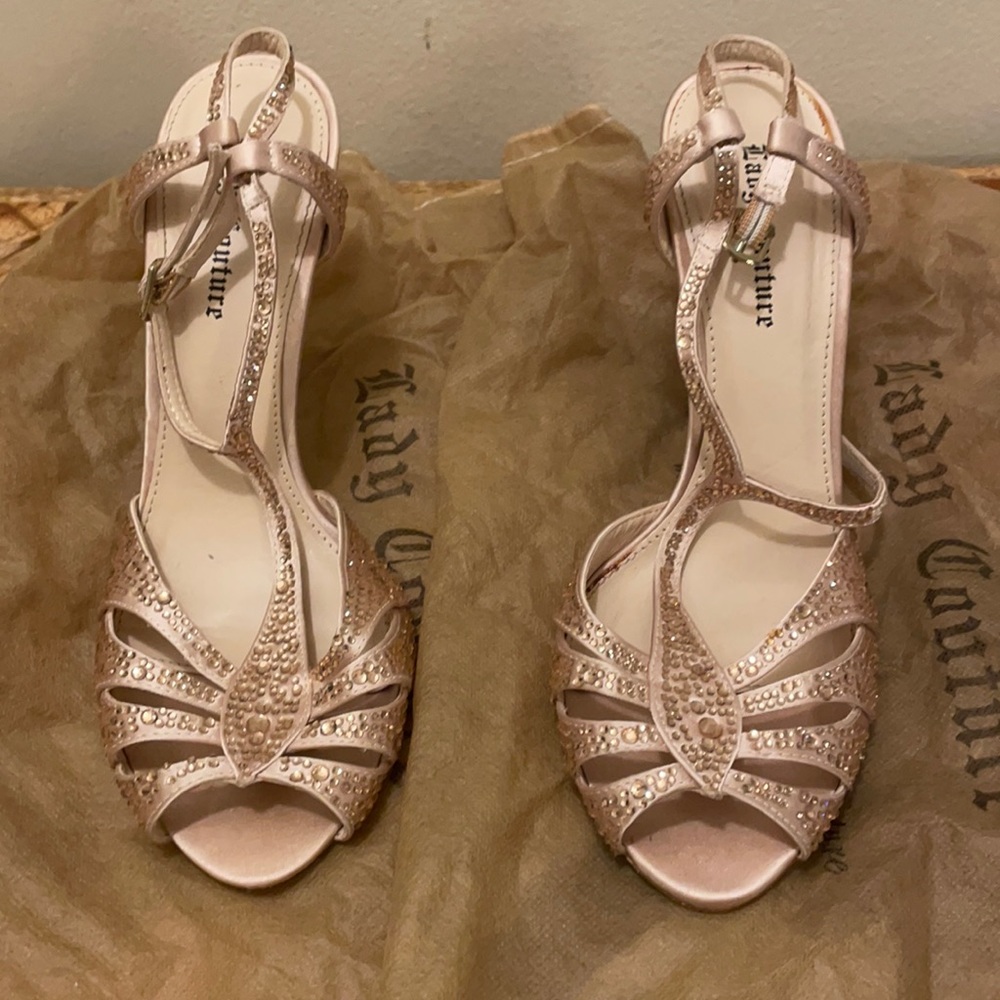 Embellished strappy peep toe heel.